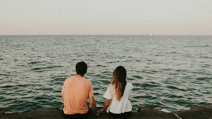 Couple looking at lake view